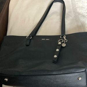 Used black leather purse the handles are a bit worn